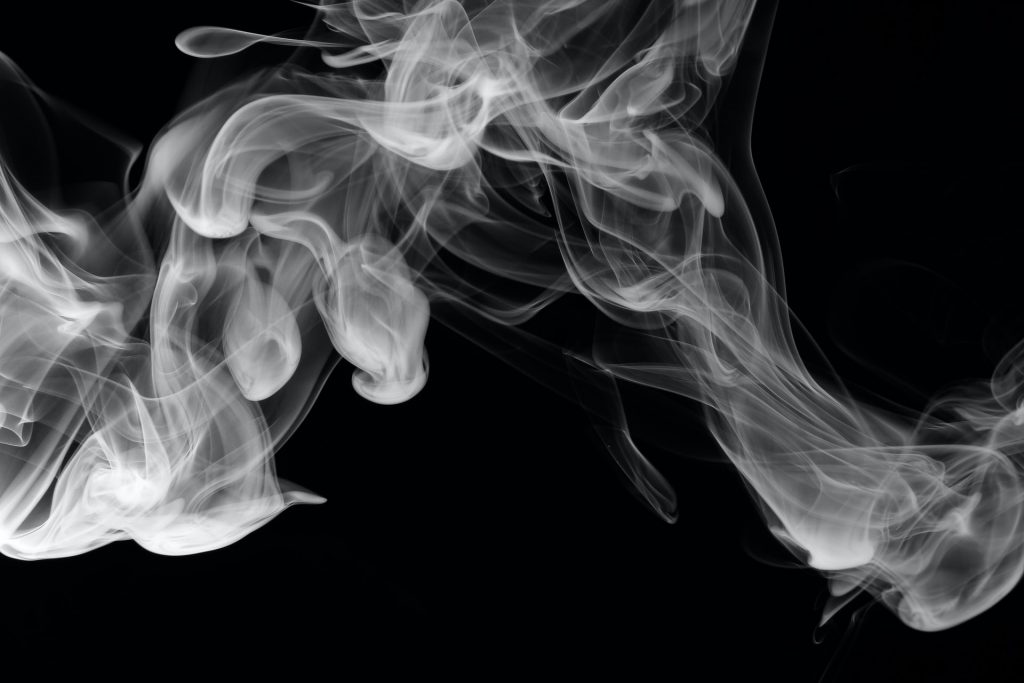 smoke against black background